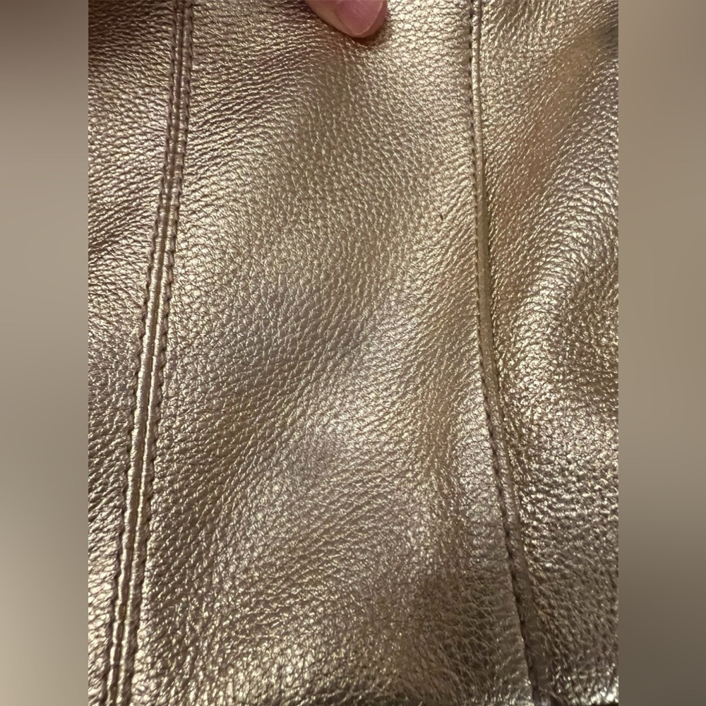 Michael Kors Metallic Gold Leather Drawstring Shoulder Bag. - Picture 12 of 16